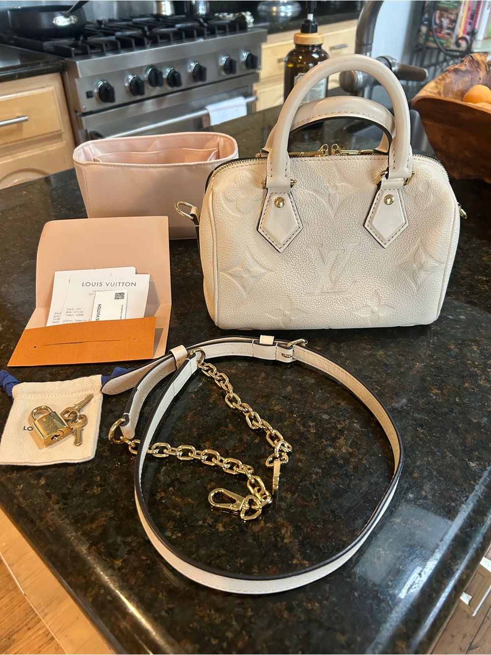 Louis Vuitton Cream Speedy 20 with Gold Hardware